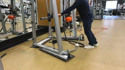 mover tilting a smith machine onto a powered lifting sled